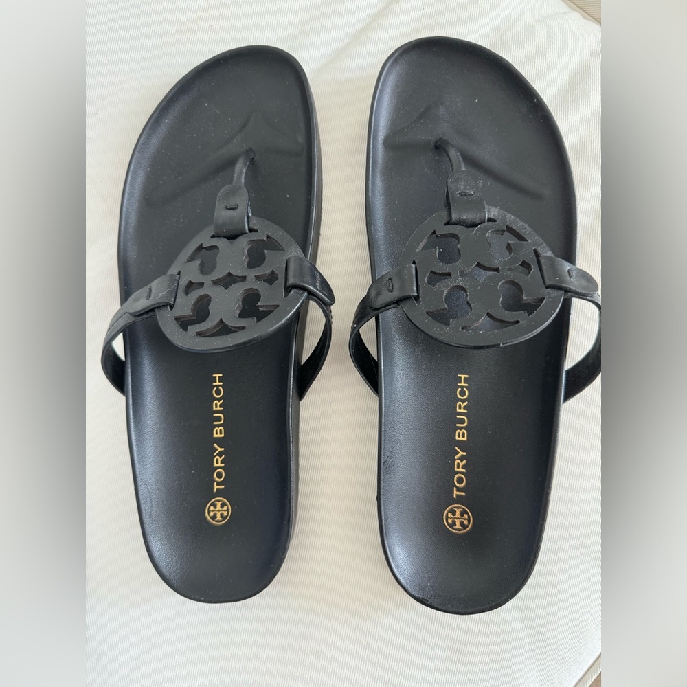 Tori Burch, “Miller Cloud” black sandal.